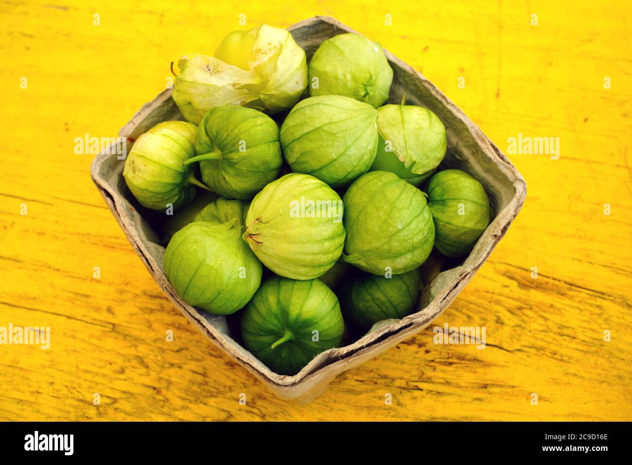 Containers of green tomatillo (Mexican husk tomato Stock Photo Alamy