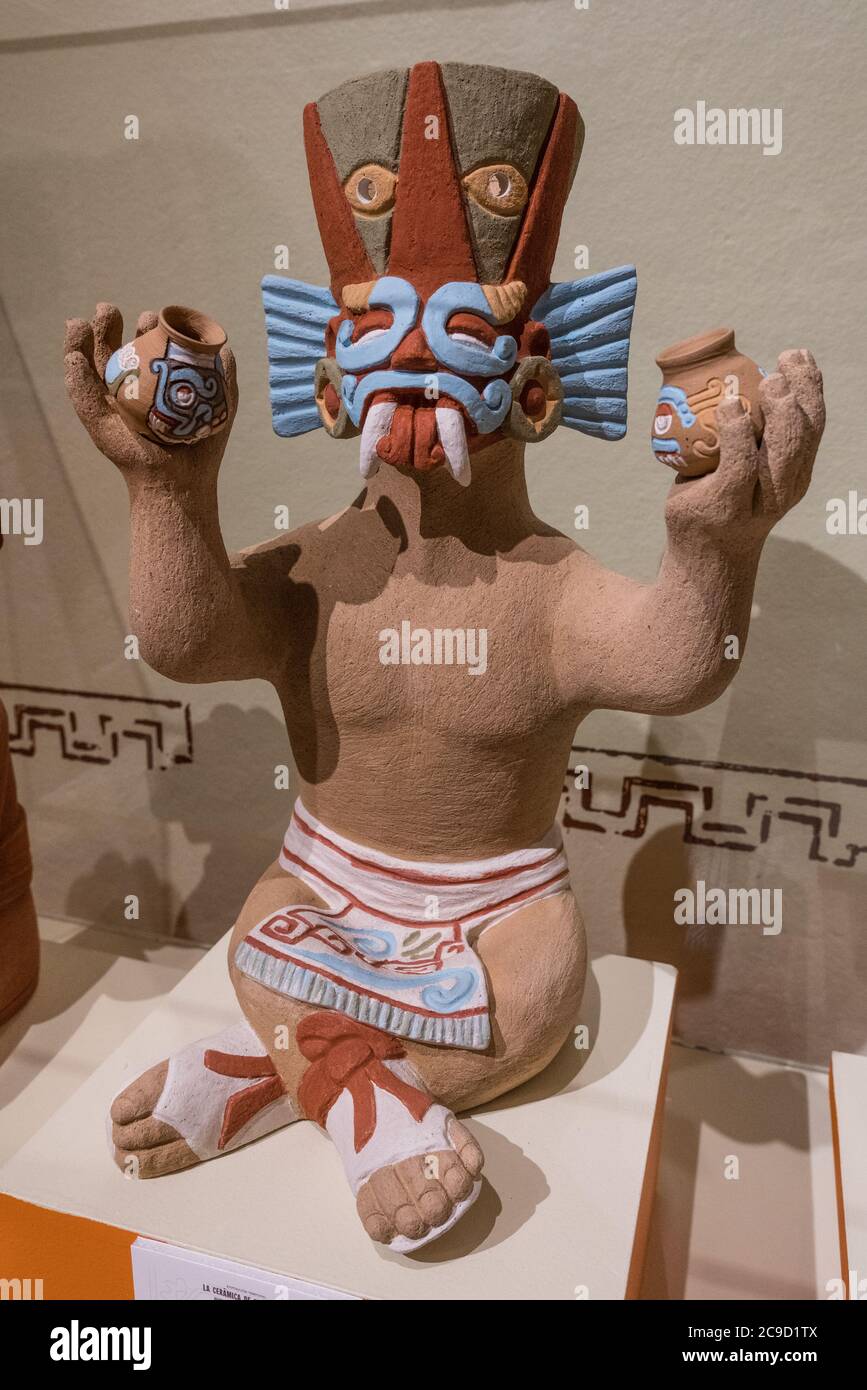 A modern representation of Zapotec ceramics by artist Lalo Martinez, representing the Zapotec diety Cosijo, the god of lightning.  Site Museum of Mont Stock Photo