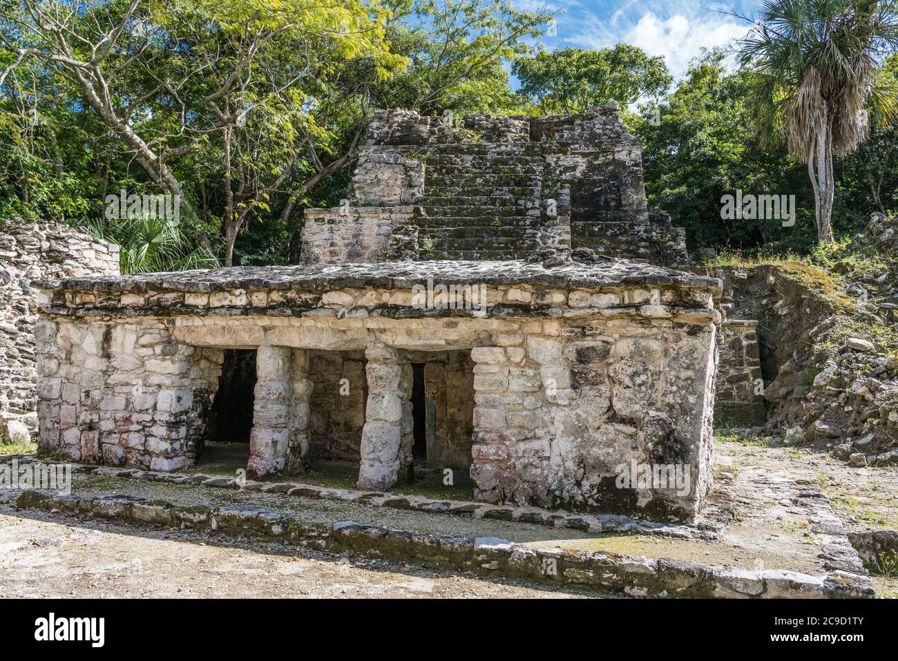 Structure 7H-3 in the ruins of the Mayan city of Muyil or Chunyaxche in the Sian Ka'an UNESCO World Biosphere Reserve in Quintana Roo, Mexico. Stock Photo