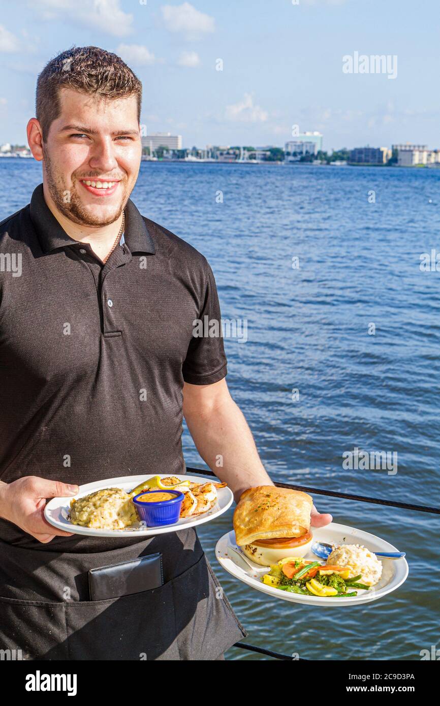 Bradenton Florida,Palmetto,Manatee River water,Regatta Pointe Marina,River waterhouse Reef and Grill,restaurant restaurants food dining eating out caf Stock Photo