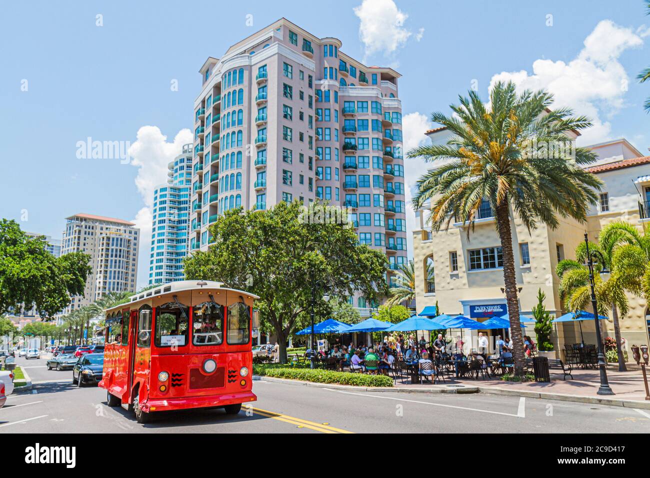 Florida St. Saint Petersburg,Beach Drive city skyline trolley,Parkshore Grill restaurant al fresco dining tables umbrellas Stock Photo