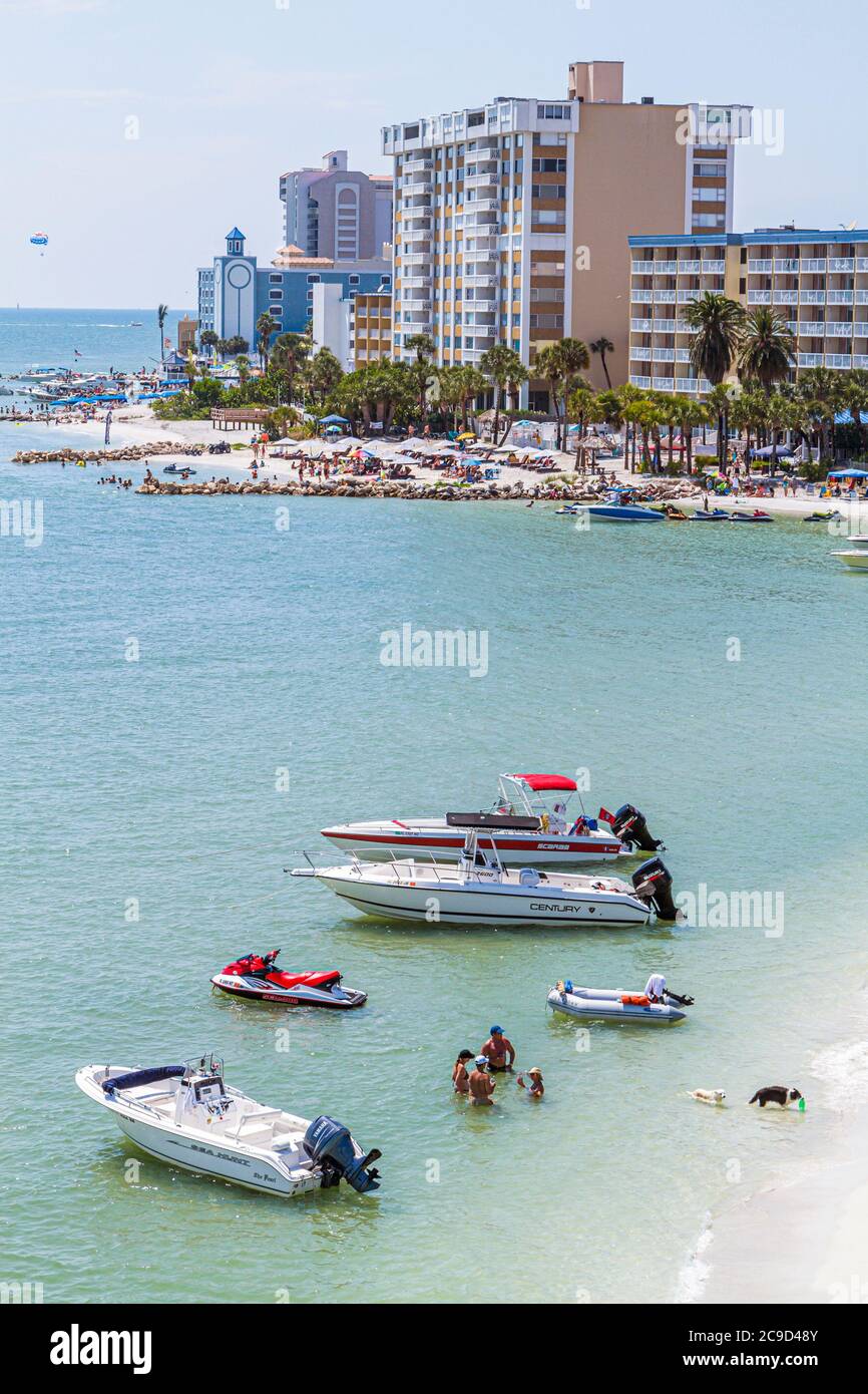 Clearwater Beach Florida,Gulf of Mexico Coast,Clearwater Harbor,harbour,public beach beaches,boats,sunbathers,visitors travel traveling tour tourist t Stock Photo