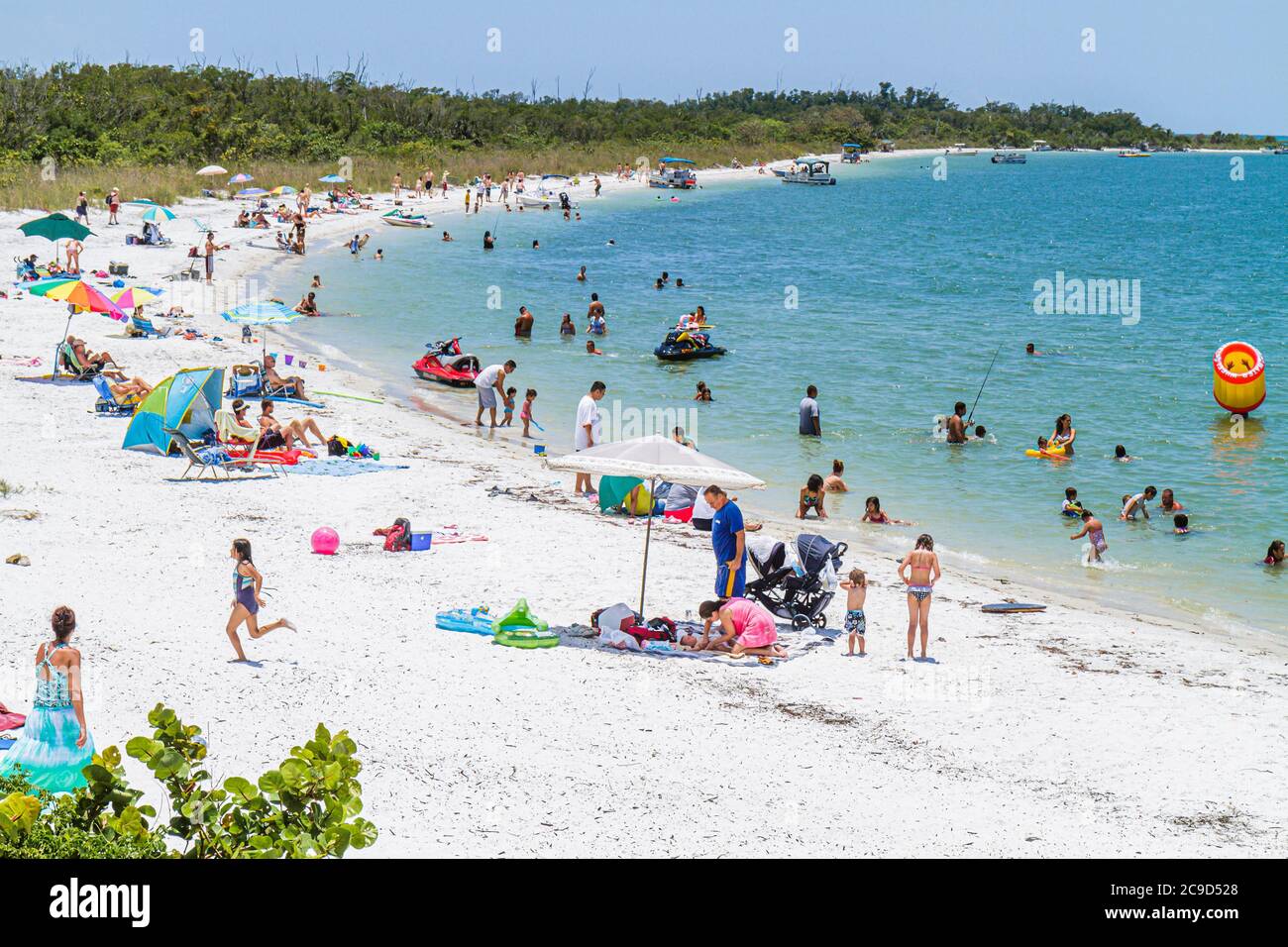 Florida Lee County,Ft. Fort Myers,Estero,Carl E. Johnson State  Park,sunbathers,public beach beaches,visitors travel traveling tour tourist  tourism lan Stock Photo - Alamy