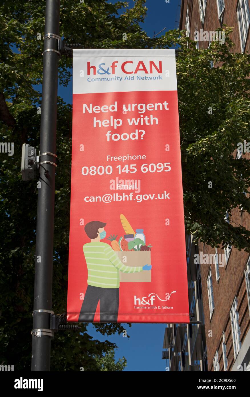 hammersmith and fulham council banner asking members of the public needing help with food to make contact, hammersmith, london, england Stock Photo