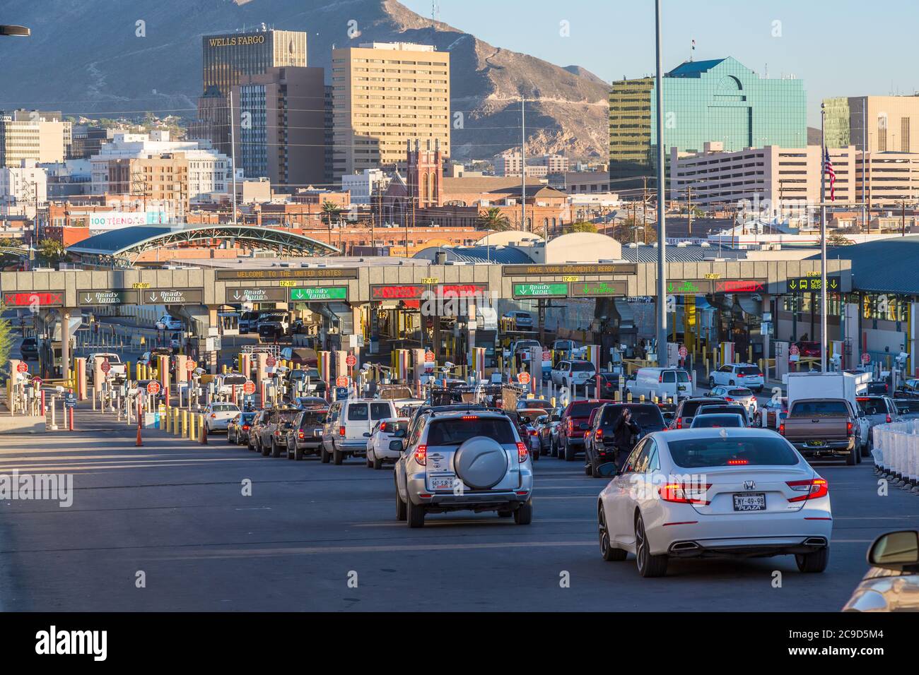 US-Mexico Border from Ciudad Juarez, Mexico Side. Approaching US Immigration Checkpoint, El Paso in the Background. Stock Photo