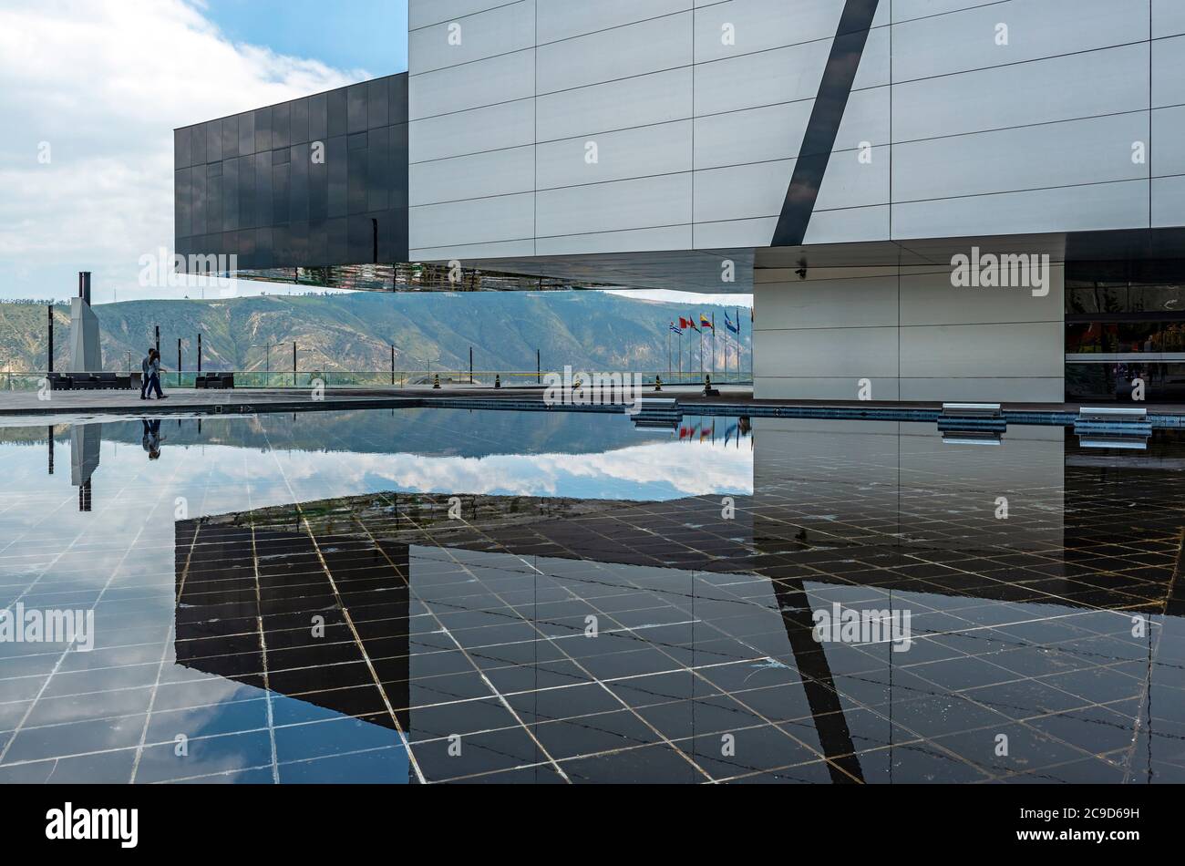 Exterior architecture reflection of the modern UNASUR (Union of South American Nations) building near the equatorial line. Stock Photo