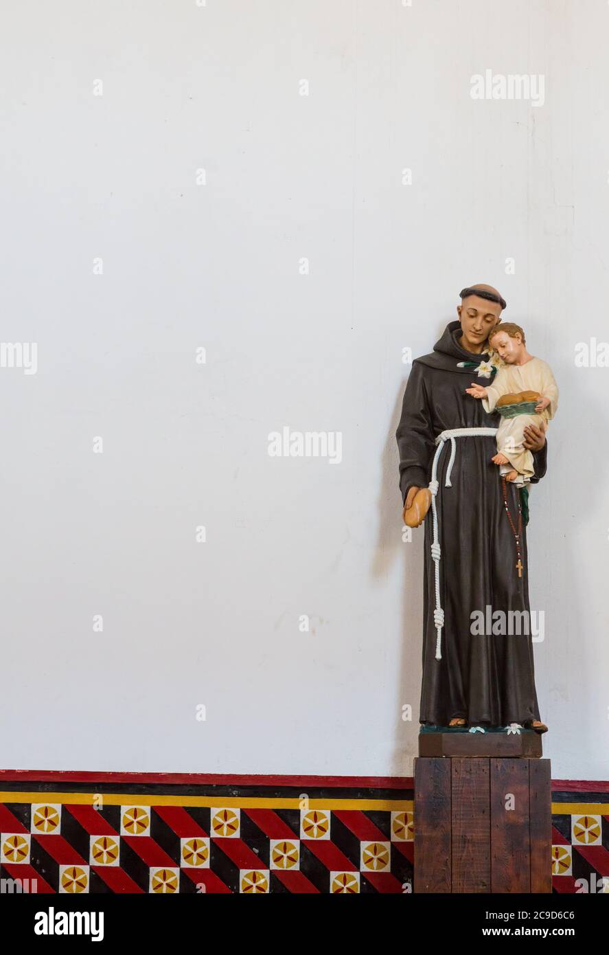 Ciudad Juarez, Chihuahua, Mexico. Saint Anthony of Padua Holding Infant Jesus and Loaf of Bread, Mission of Our Lady of Guadalupe, 17th Century. Stock Photo