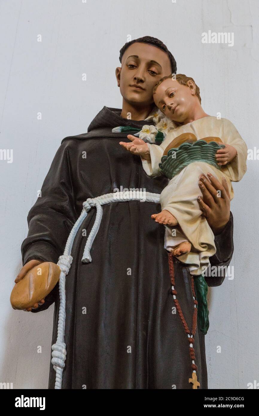 Ciudad Juarez, Chihuahua, Mexico. Saint Anthony of Padua Holding Infant Jesus and Loaf of Bread, Mission of Our Lady of Guadalupe, 17th Century. Stock Photo