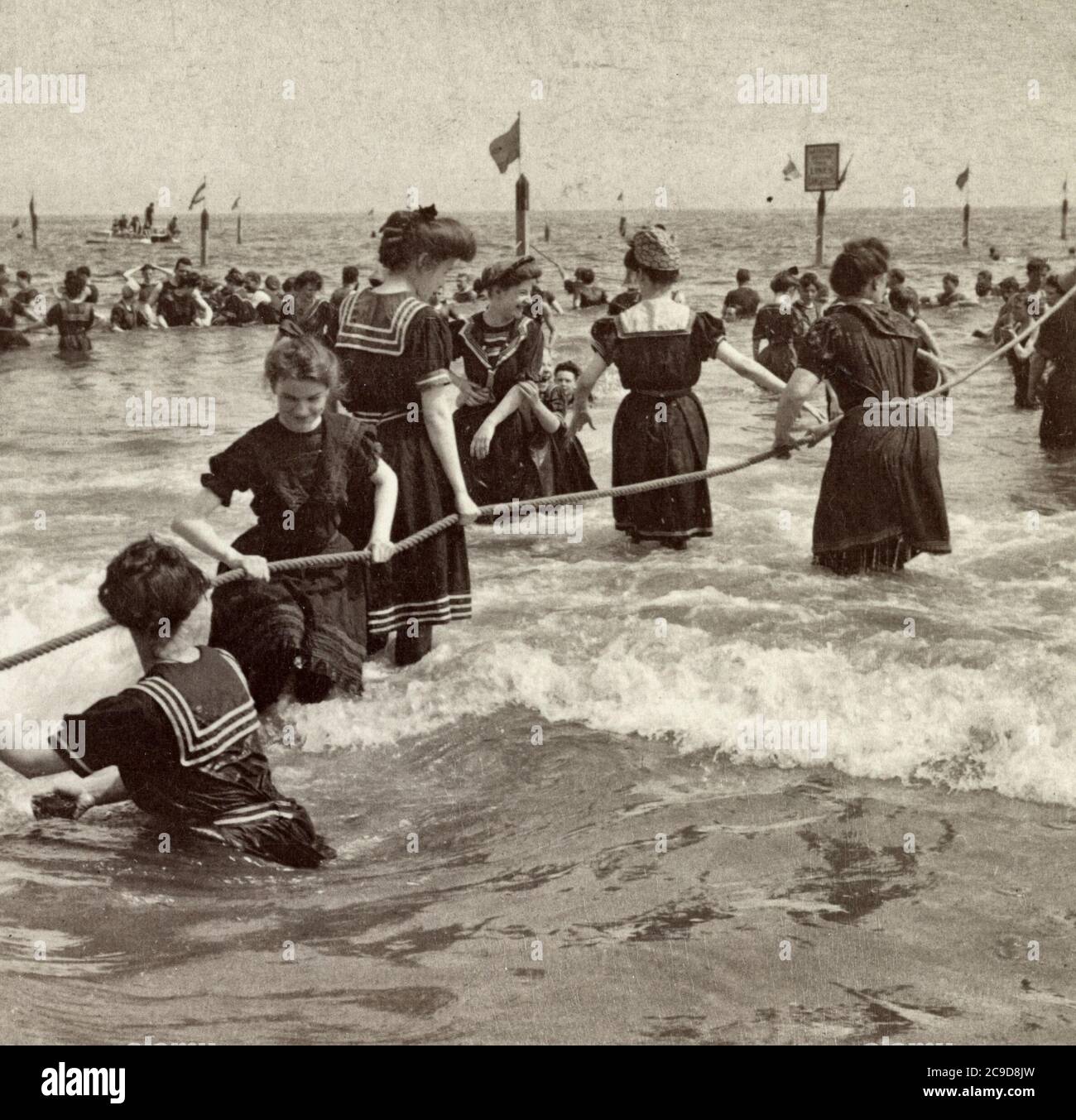 Choicest of summer's pastimes - bathing in the Atlantic at Coney Island, New York, circa 1904 Stock Photo