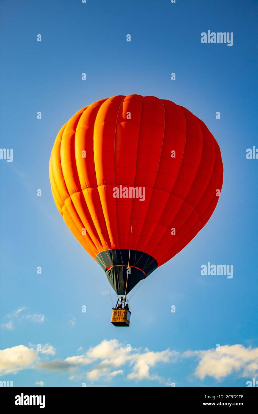 Colored hot air balloons in the blue sky Stock Photo - Alamy