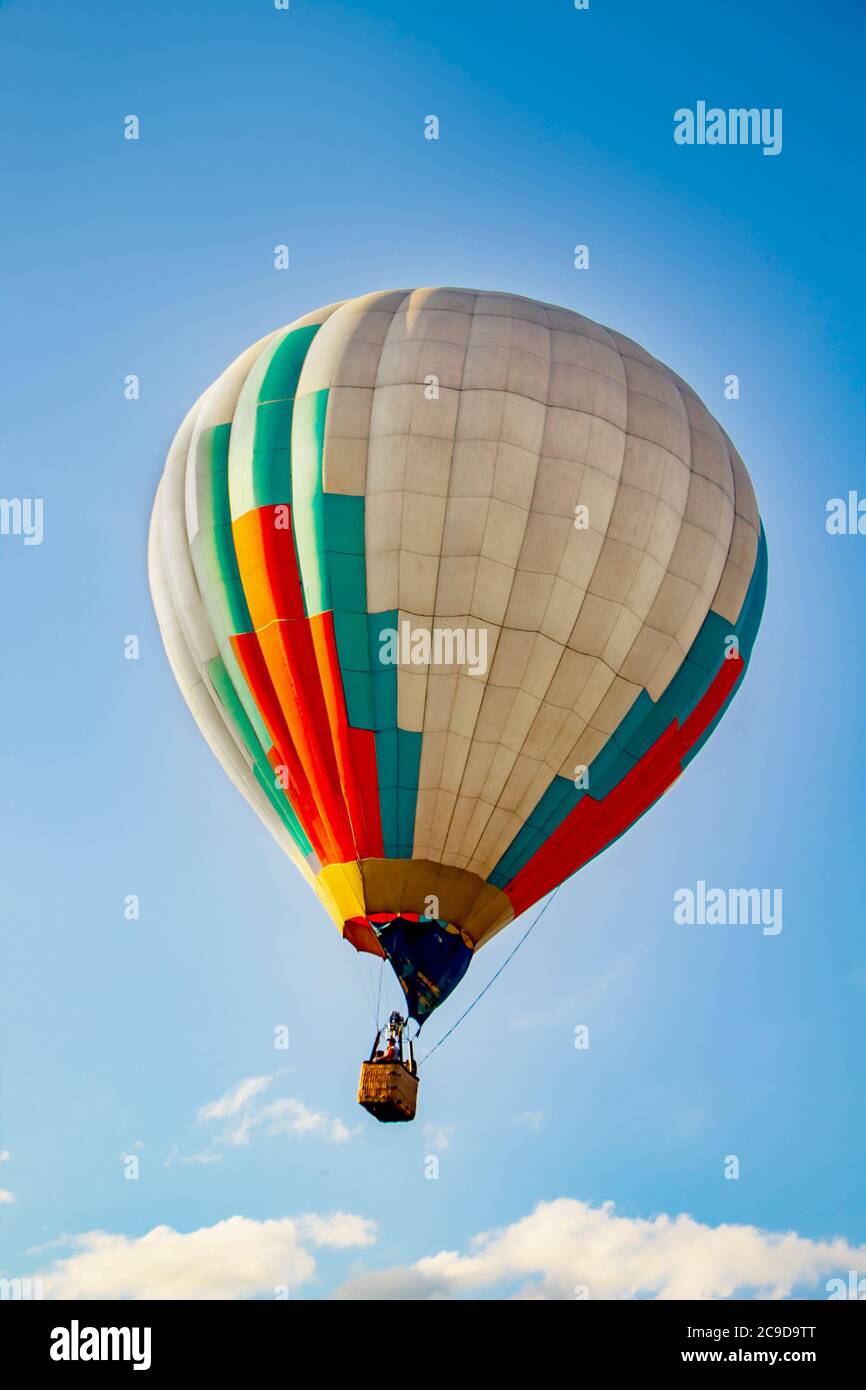 Colored hot air balloons in the blue sky Stock Photo - Alamy