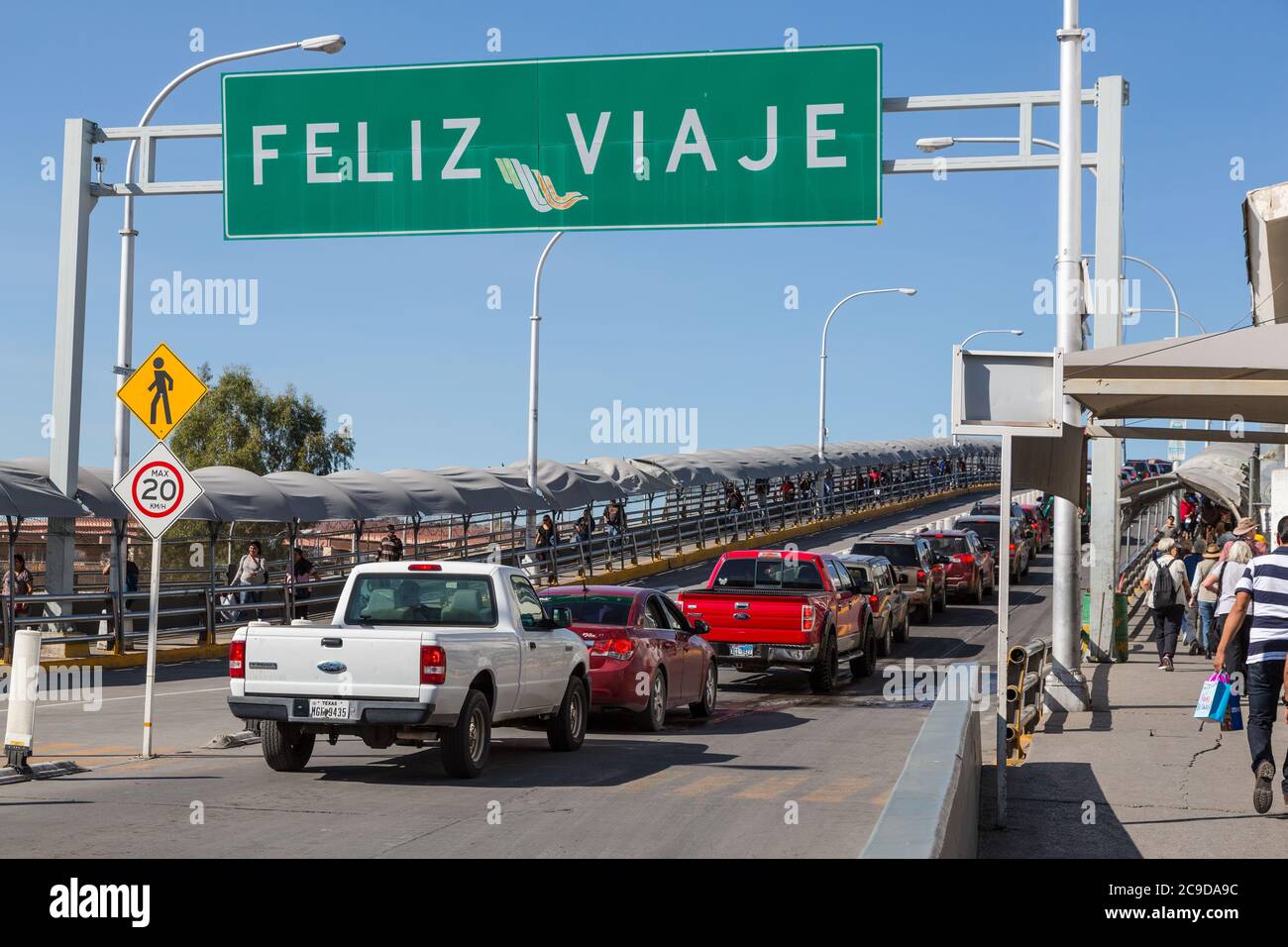 US-Mexico Border from Ciudad Juarez, Mexico Side.  'Happy Travels.' Stock Photo