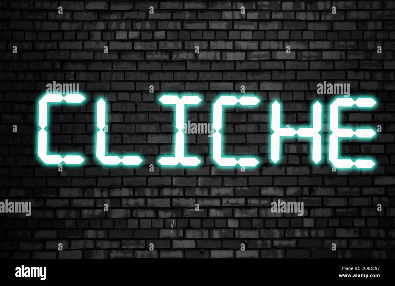 word-cliche-letters-glowing-in-dark-bricks-wall-stigma-discrimination