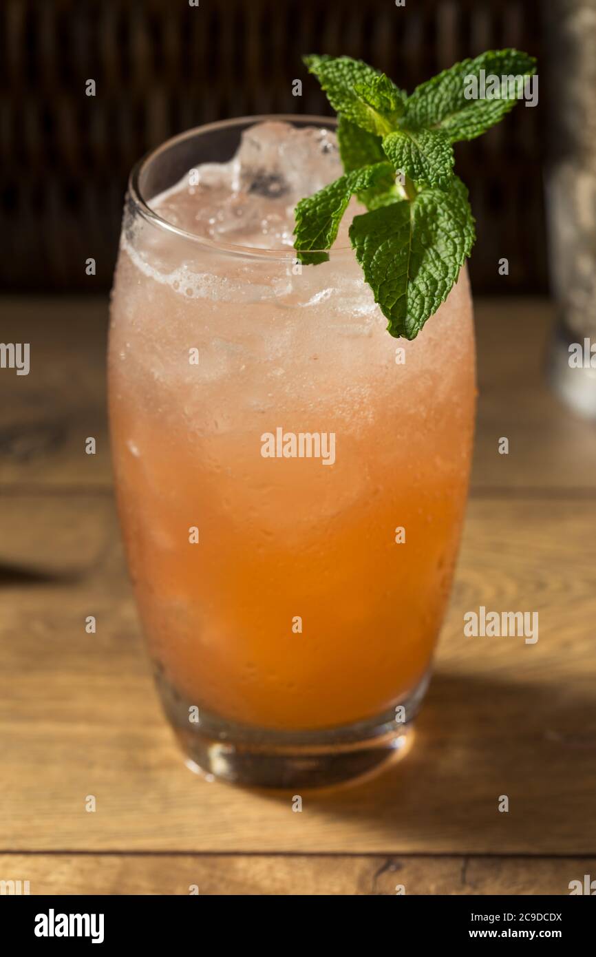 Refreshing Sweet Planters Punch Tiki Cocktail with Mint Stock Photo Alamy