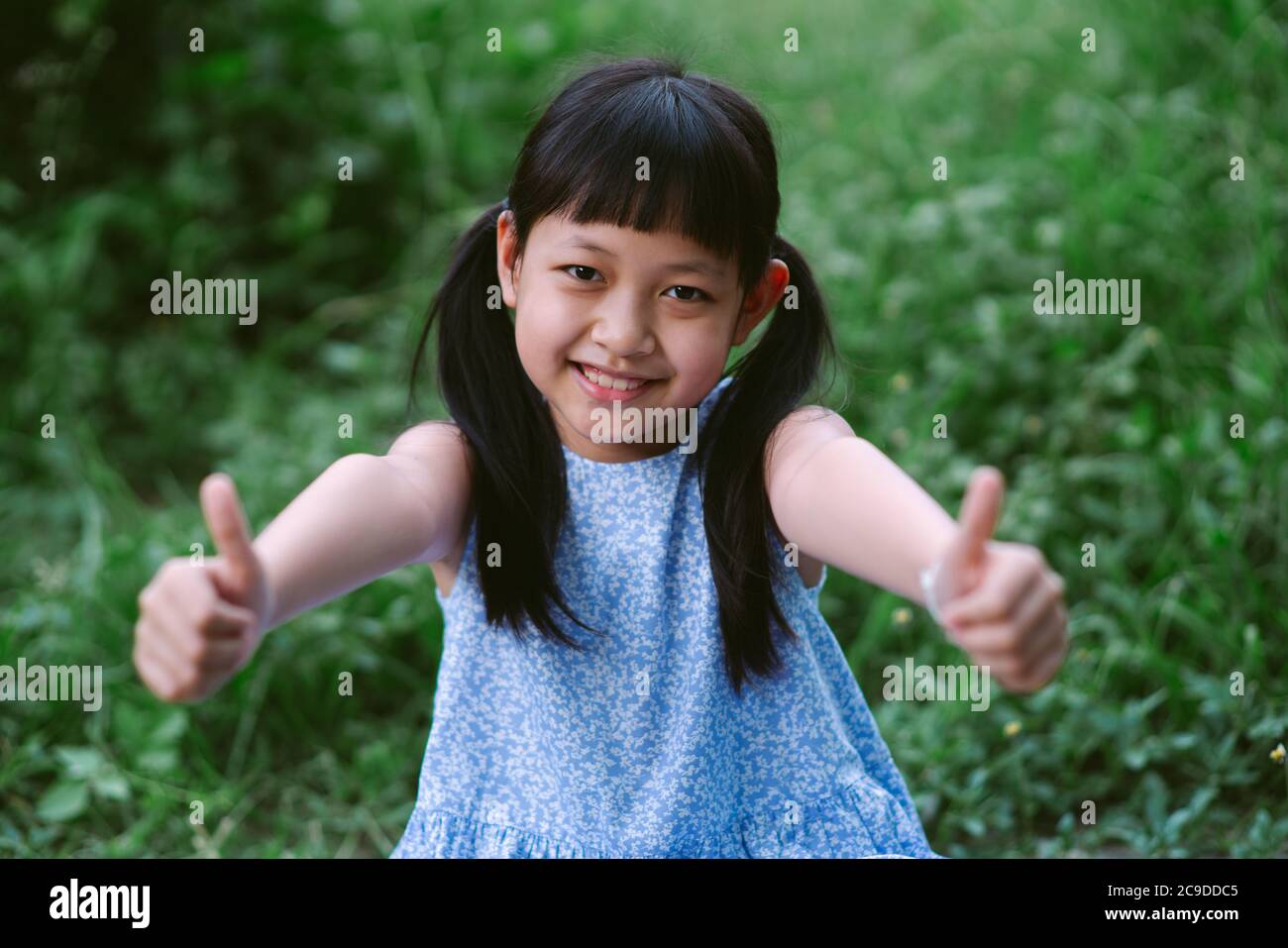 Portrait of a happy smiling asian child girl Stock Photo