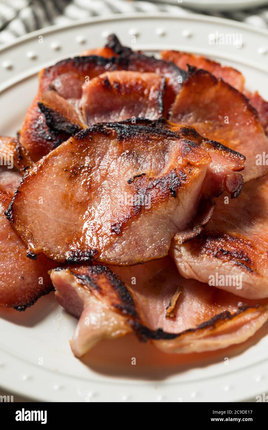 Homemade Cooked Canadian Bacon to Eat for Breakfast Stock Photo