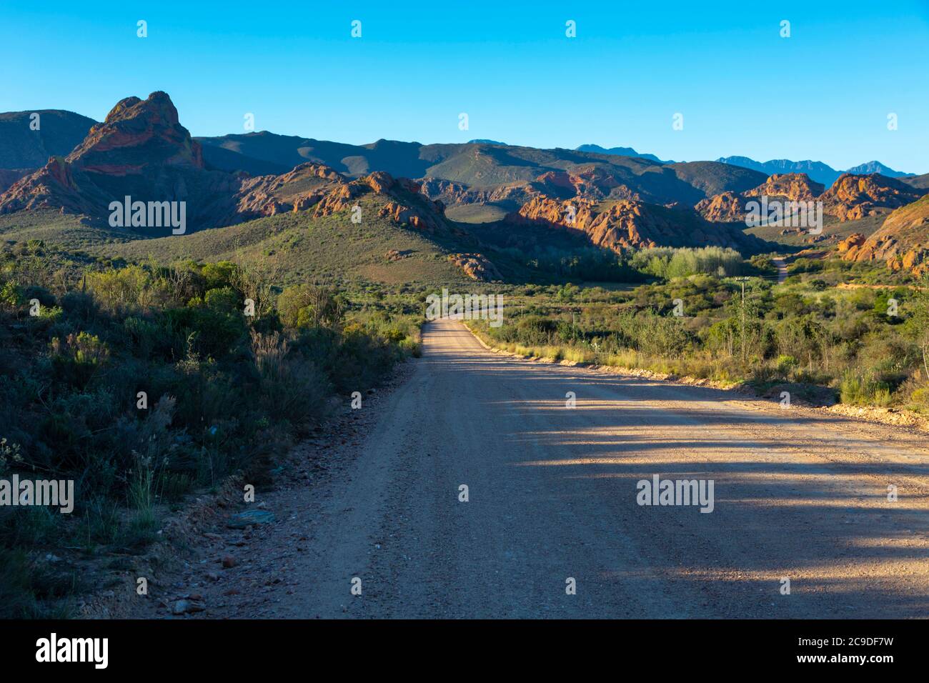 Gravel road between Bosluiskloof Pass and Seweweekspoort Stock Photo ...