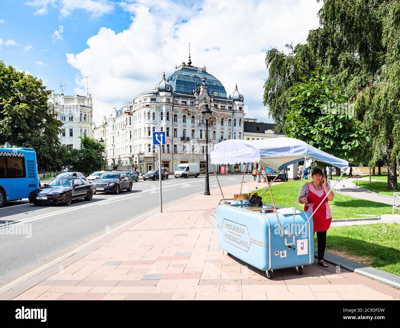 MOSCOW, RUSSIA - JULY 19, 2020: ice cream stall and view of Bolshaya Nikitskaya street on sunny summer day. The street originated in the Middle Ages a Stock Photo
