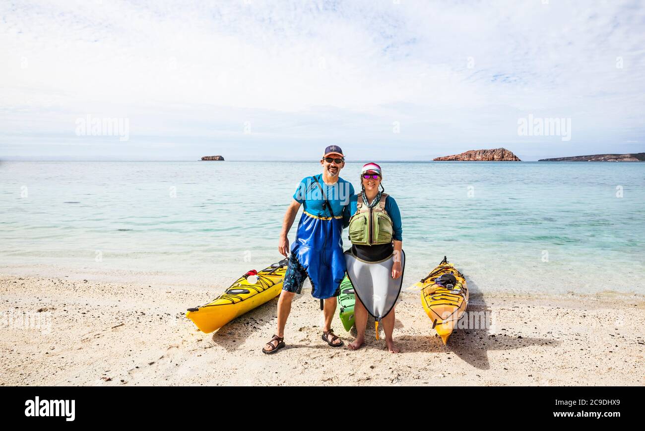 @amywormsworld and @TimothyMMcGuire ready to kayak after a snorkeling session. #TravelLifestyle #Portraits #OnTheBeach, Isla Espiritu Santo, day 2. #S Stock Photo
