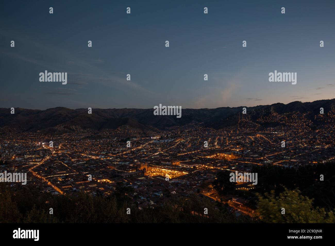 Panoramic night view over Cusco, the capital of Inca Empire from Peru Stock Photo