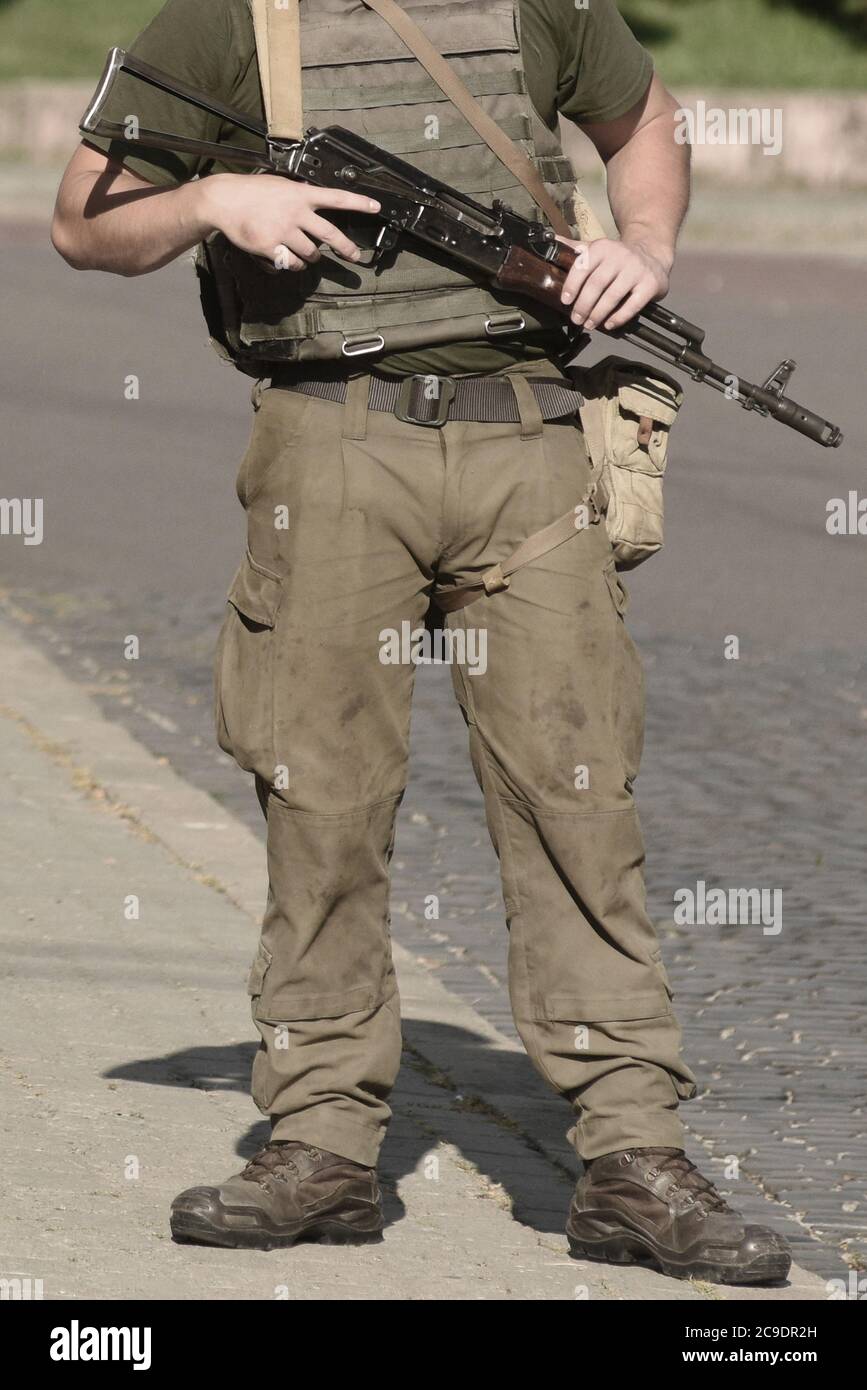 Soldier Military with weapon. Armed forces, troops, army. Soldier with    Kalashnikov assault rifle (AK-74) Stock Photo