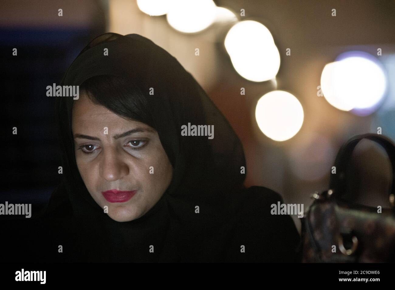 Muslim woman wearing black hijab. Souq Waqif, Doha, Qatar Stock Photo