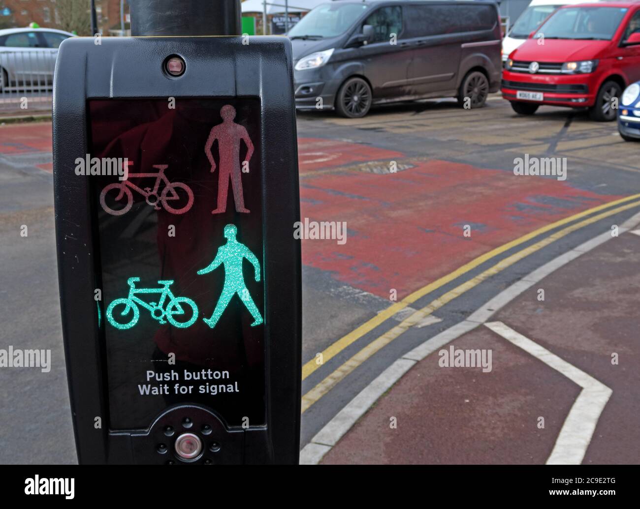 Green Man - Cross now, Pelican Crossing, England, UK Stock Photo