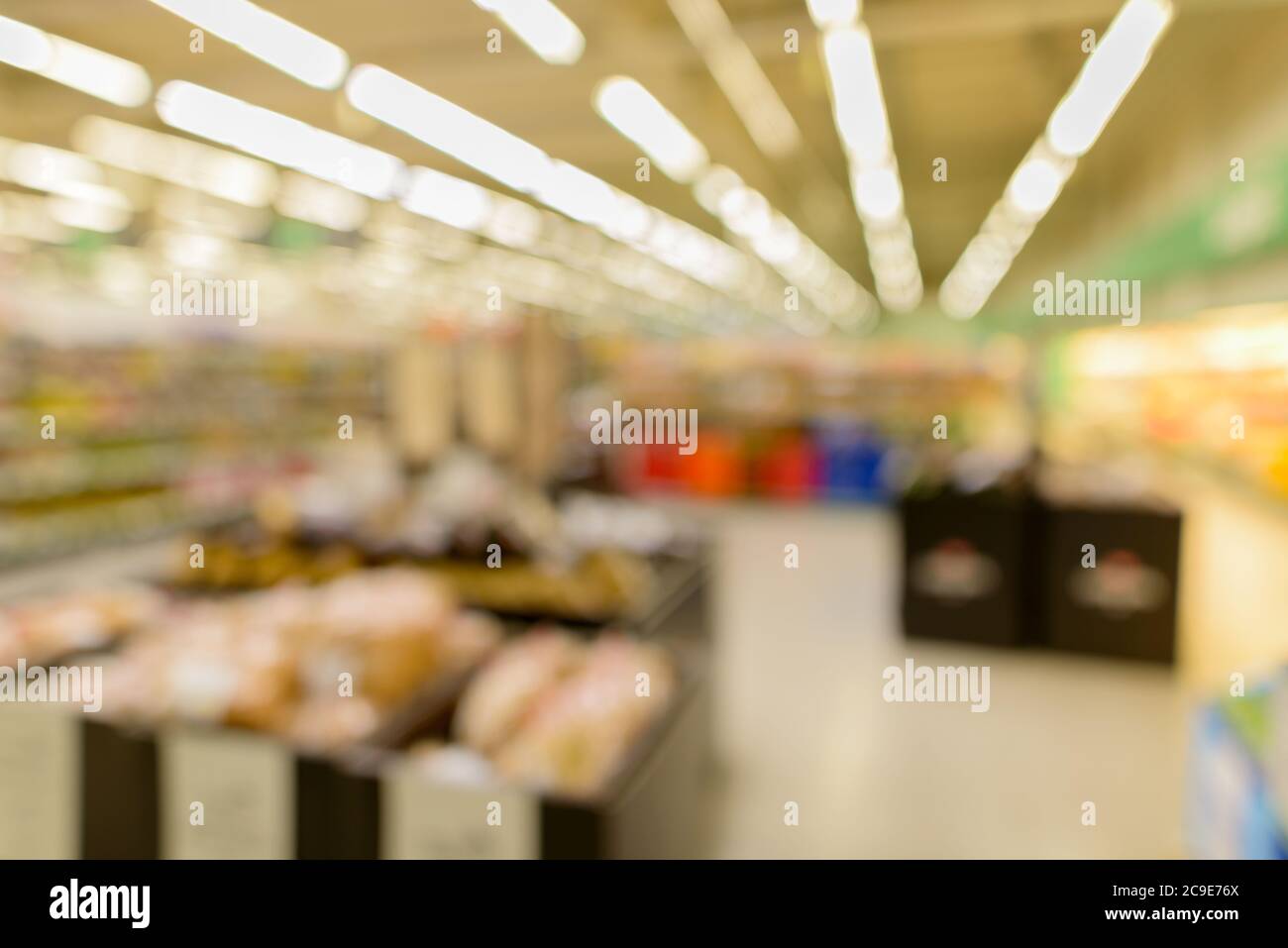 Defocused supermarket with retail store interior in the shopping mall Stock Photo