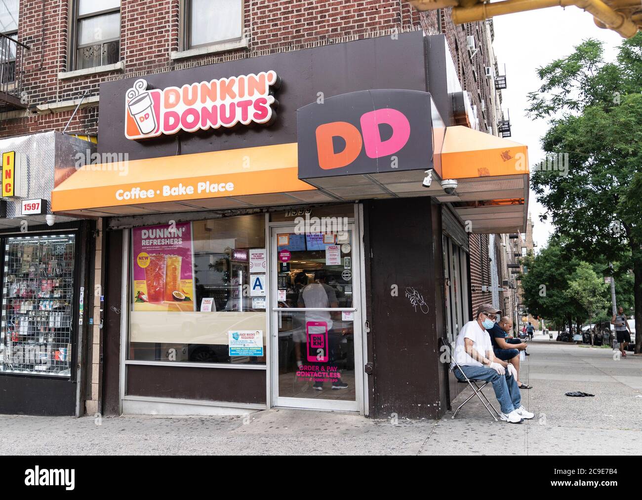 New York, United States. 30th July, 2020. View of Dunkin' Donuts store in Inwood, Manhattan, New