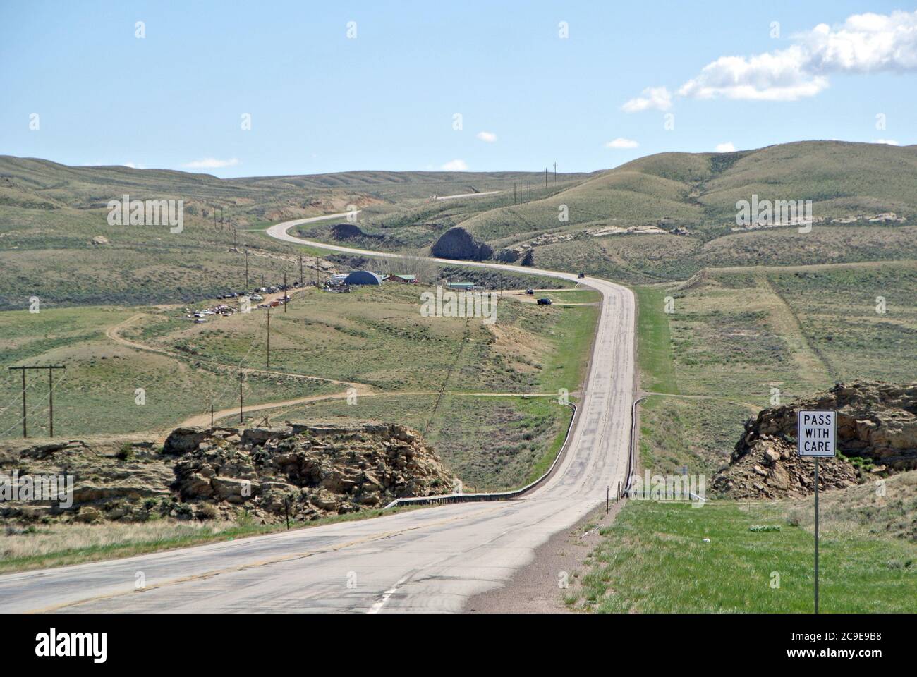 view of historic route 30winding through hills in western wyoming Stock Photo