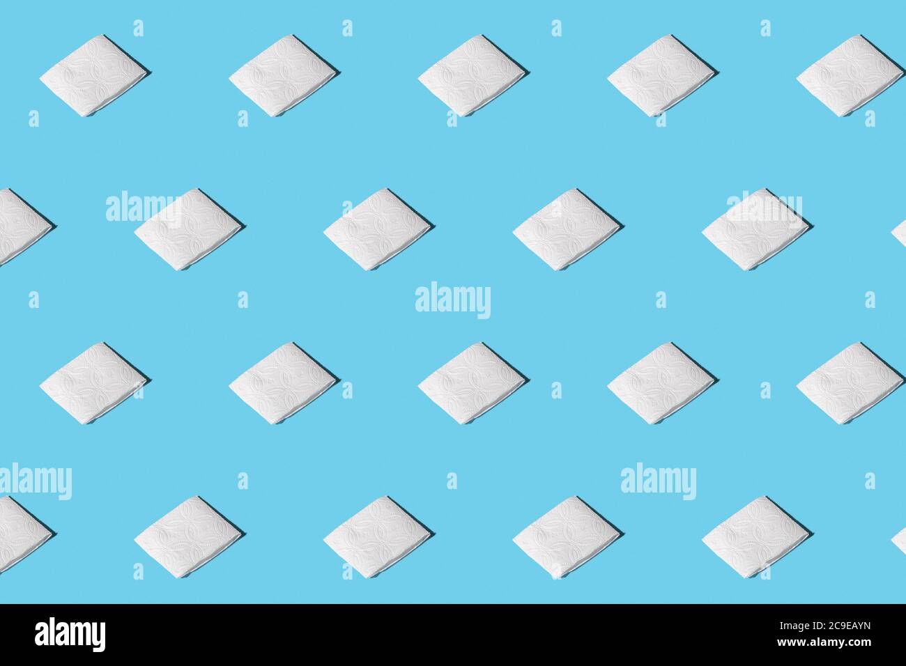 Trendy pattern from clean napkins. Clean paper towels with soft shadow. Isometric pattern on blue background Stock Photo