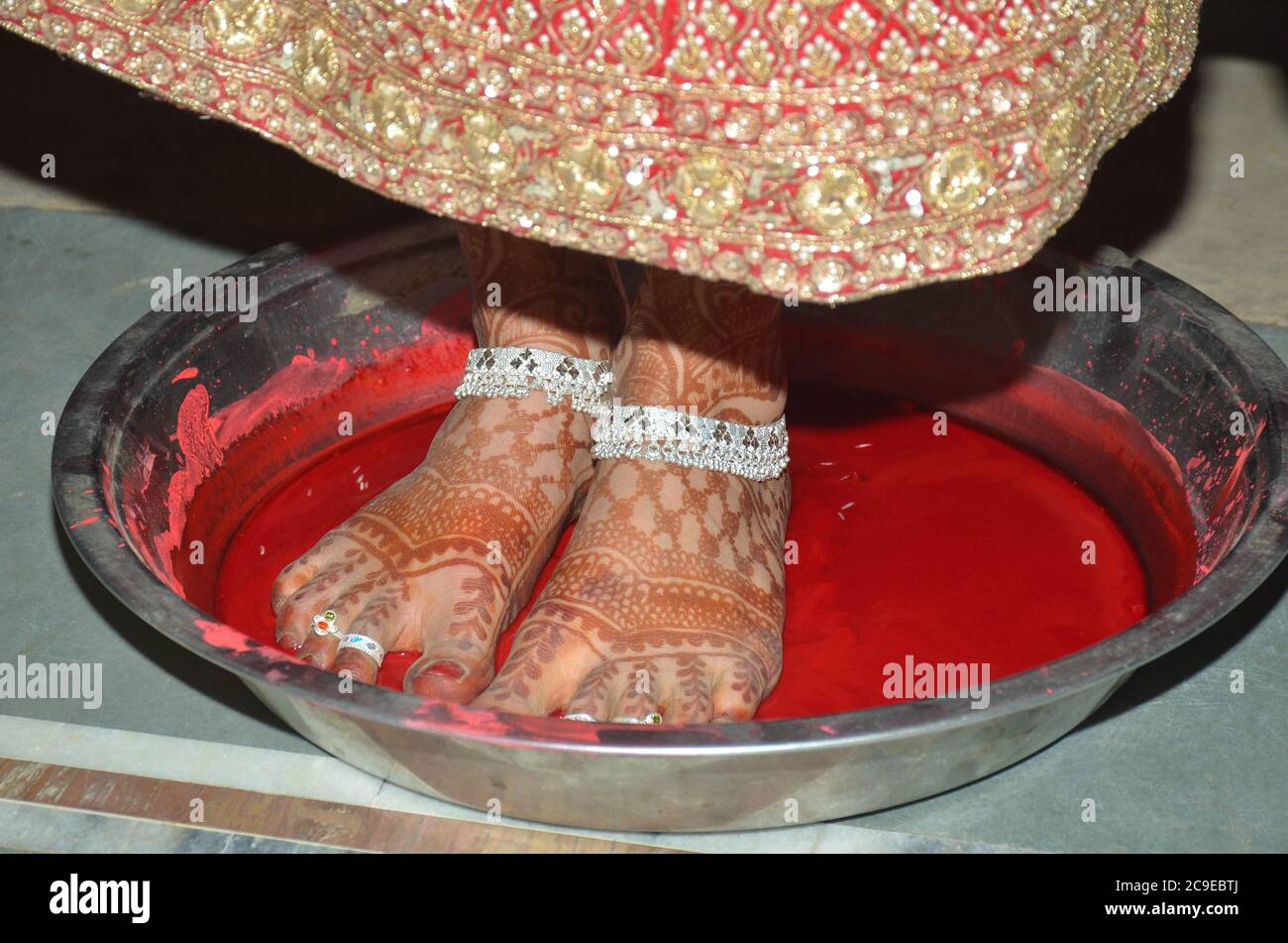 In India, the bride is coming home for the first time after her wedding Stock Photo