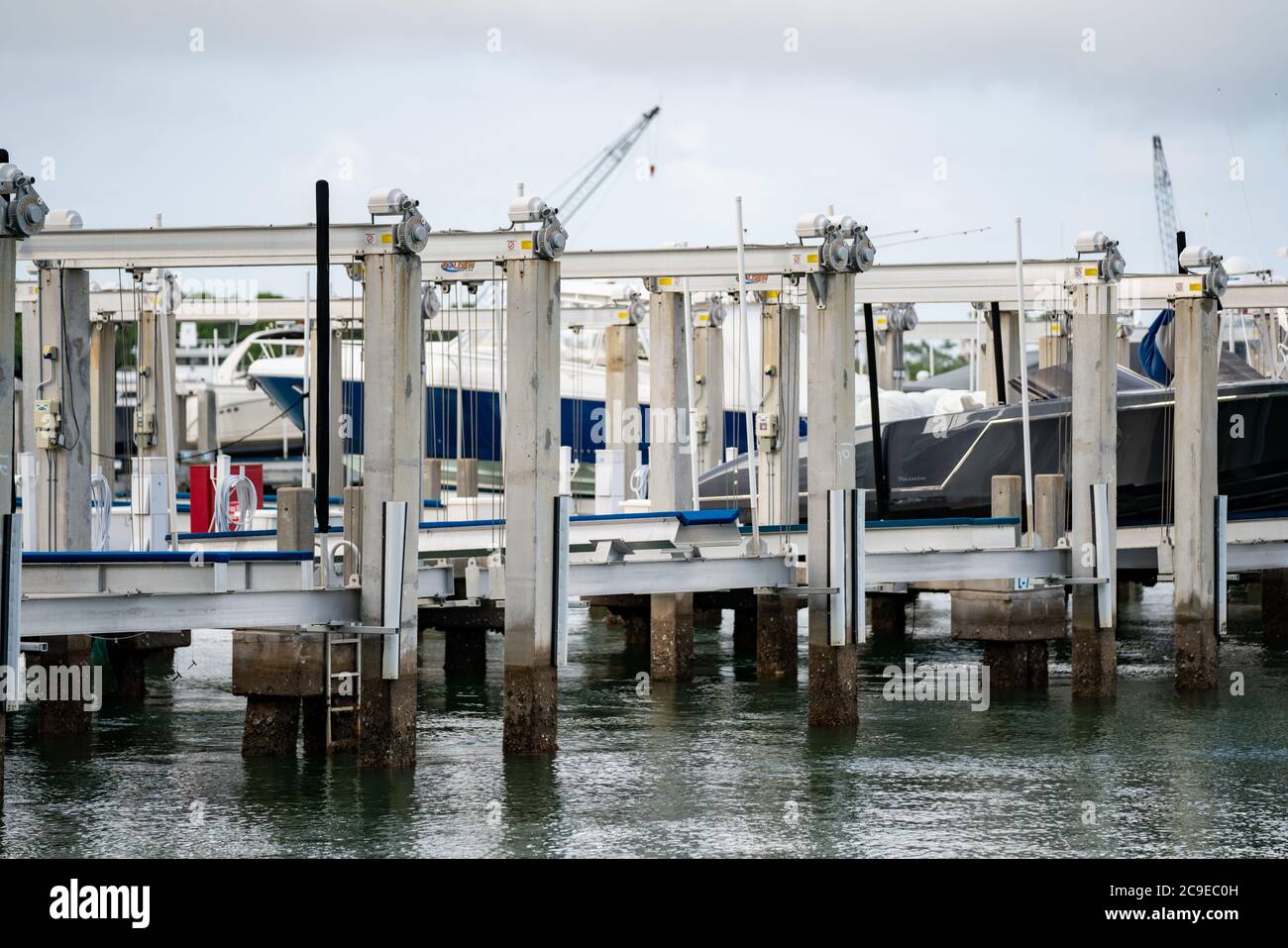 Photo of mechanical motorized boat lifts Miami Beach Marina Stock Photo
