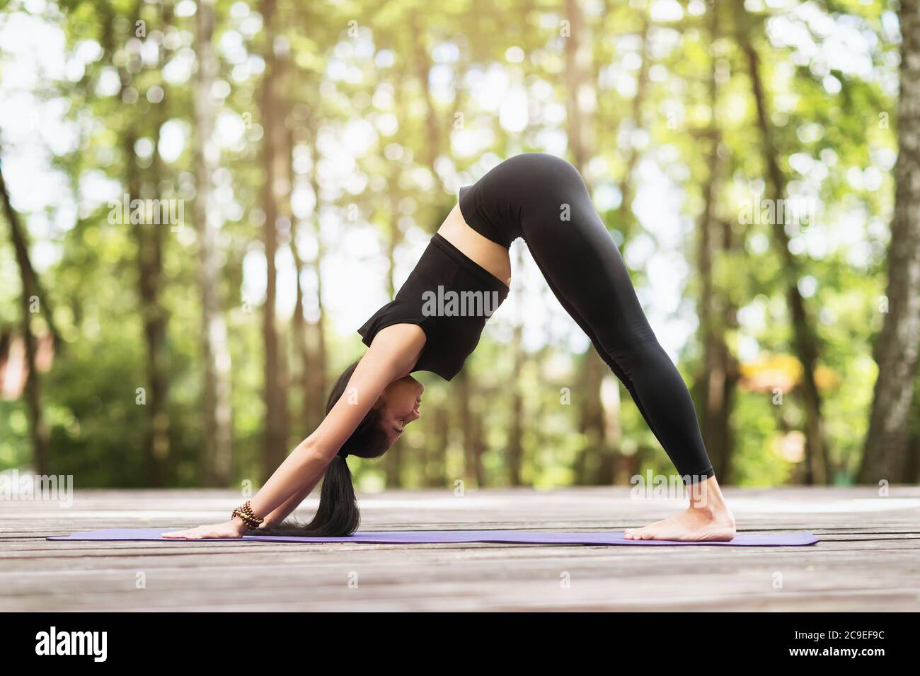 Standing Pigeon Pose High Resolution Stock Photography and Images Standing Pigeon Pose High Resolution Stock Photography and Images