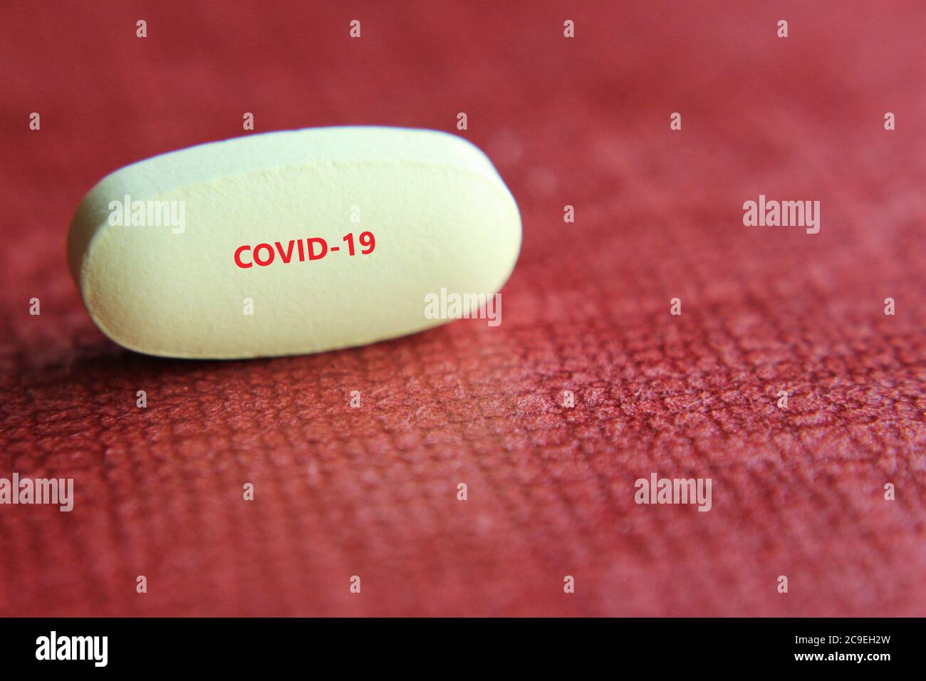 Covid-19 medicine stock photo isolate on red copy space front view Stock Photo