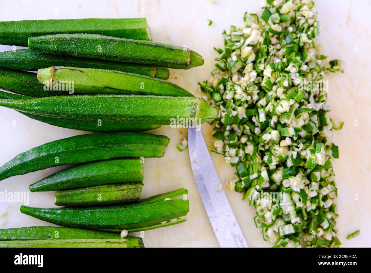 Nigerian chopped and diced okro or okra to prepare sauce Stock Photo