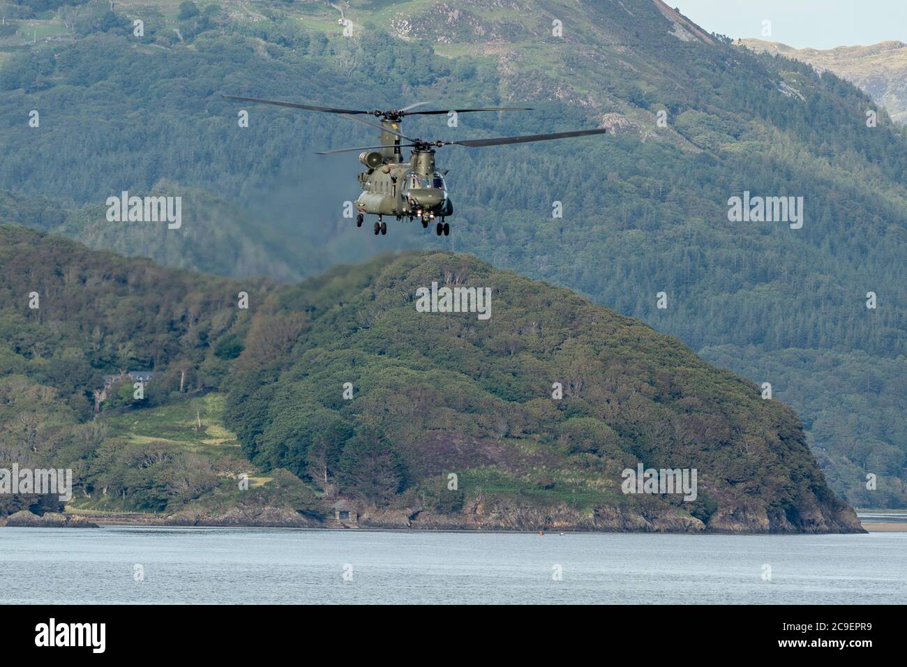 Chinook flying down the Mawddach estuary Stock Photo