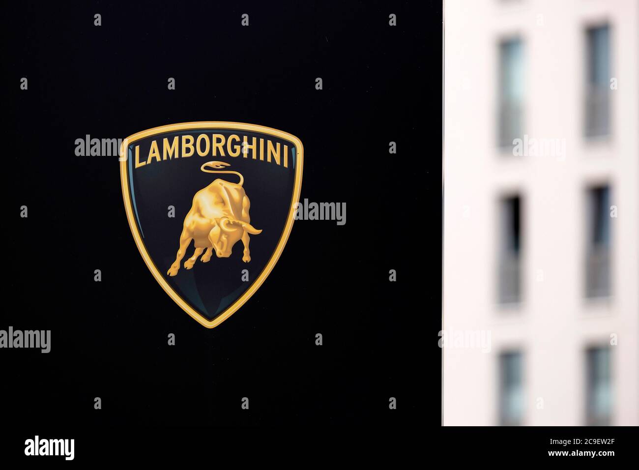 Cologne, Deutschland. 28th July, 2020. The logo of the car manufacturer Lamborghini, which belongs to the Volkswagen Group as part of Audi AG, on the grounds of Motorworld Koln Rheinland. Koln, July 28, 2020 | usage worldwide Credit: dpa/Alamy Live News Stock Photo
