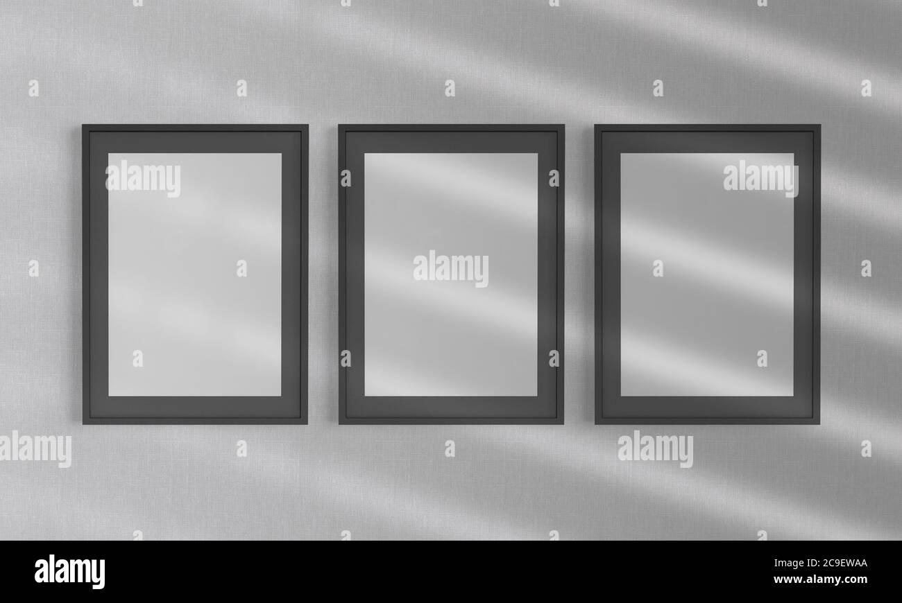 Black frames on a wall mockup 3d rendering Stock Photo - Alamy