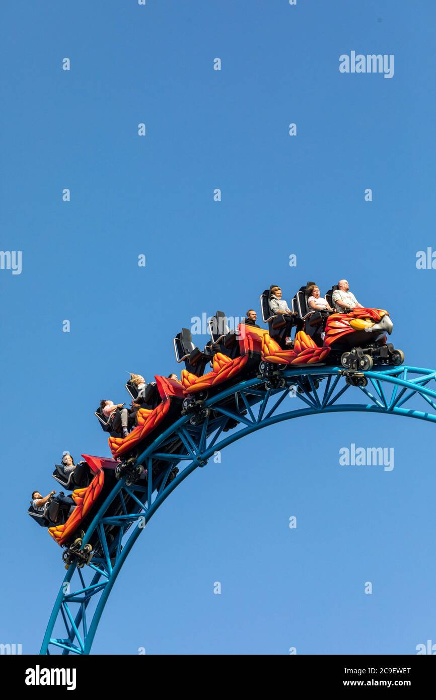 Launched roller coaster Taiga in action at Linnanmäki amusement park in Helsinki, Finland Stock Photo