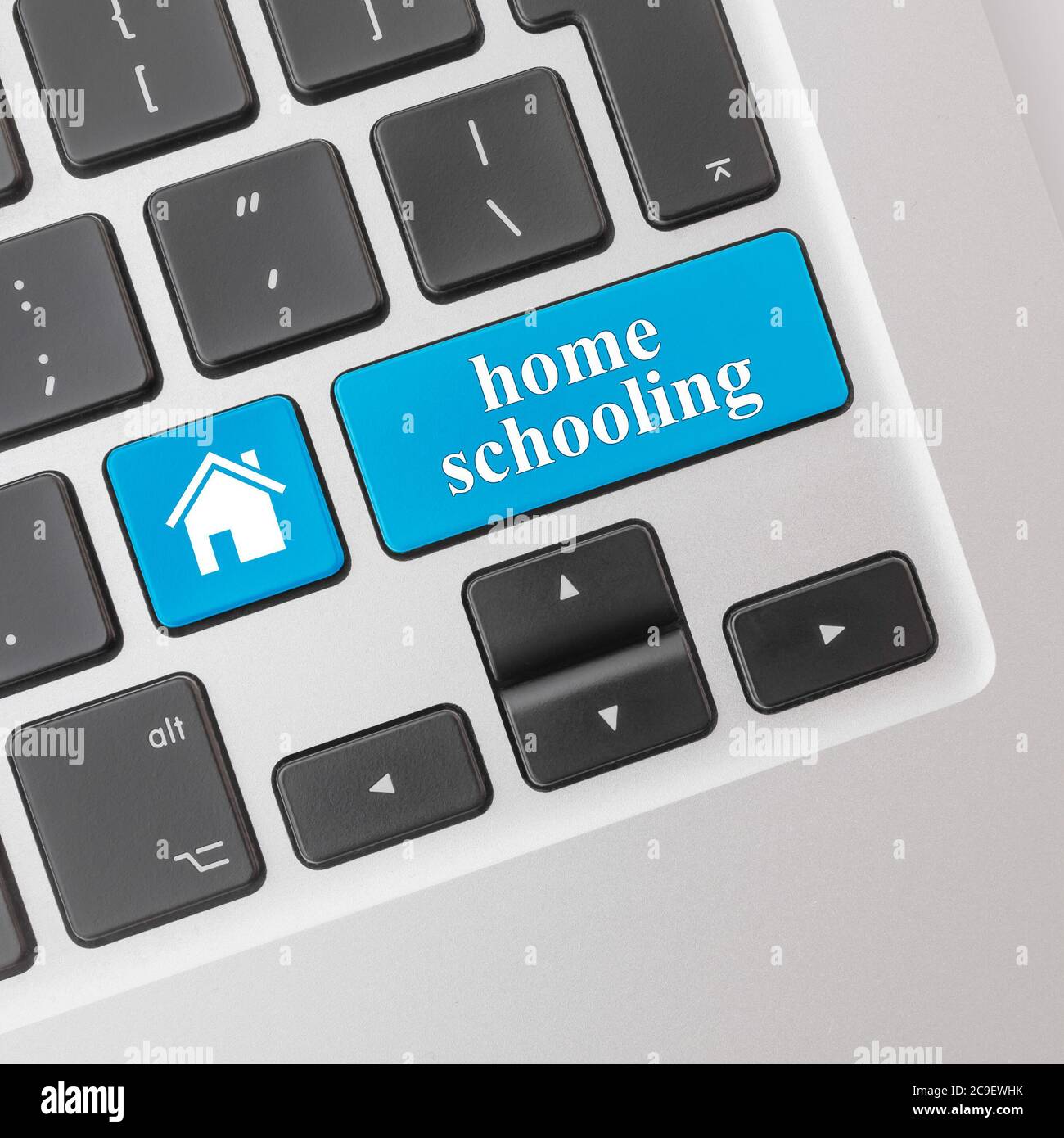 Home schooling concept. Computer keyboard with the word homeschooling. Stock Photo