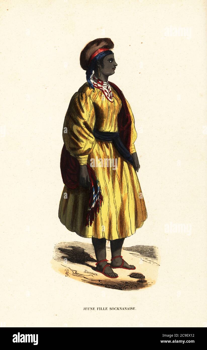 Young girl of Sokna, Fezzan, Kingdom of Tripoli (Libya). The women of Sokna  wear dresses of striped silk or tulle, silver earrings, bracelets and leg  ornaments. Jeune fille Socknanaise. A Soka les