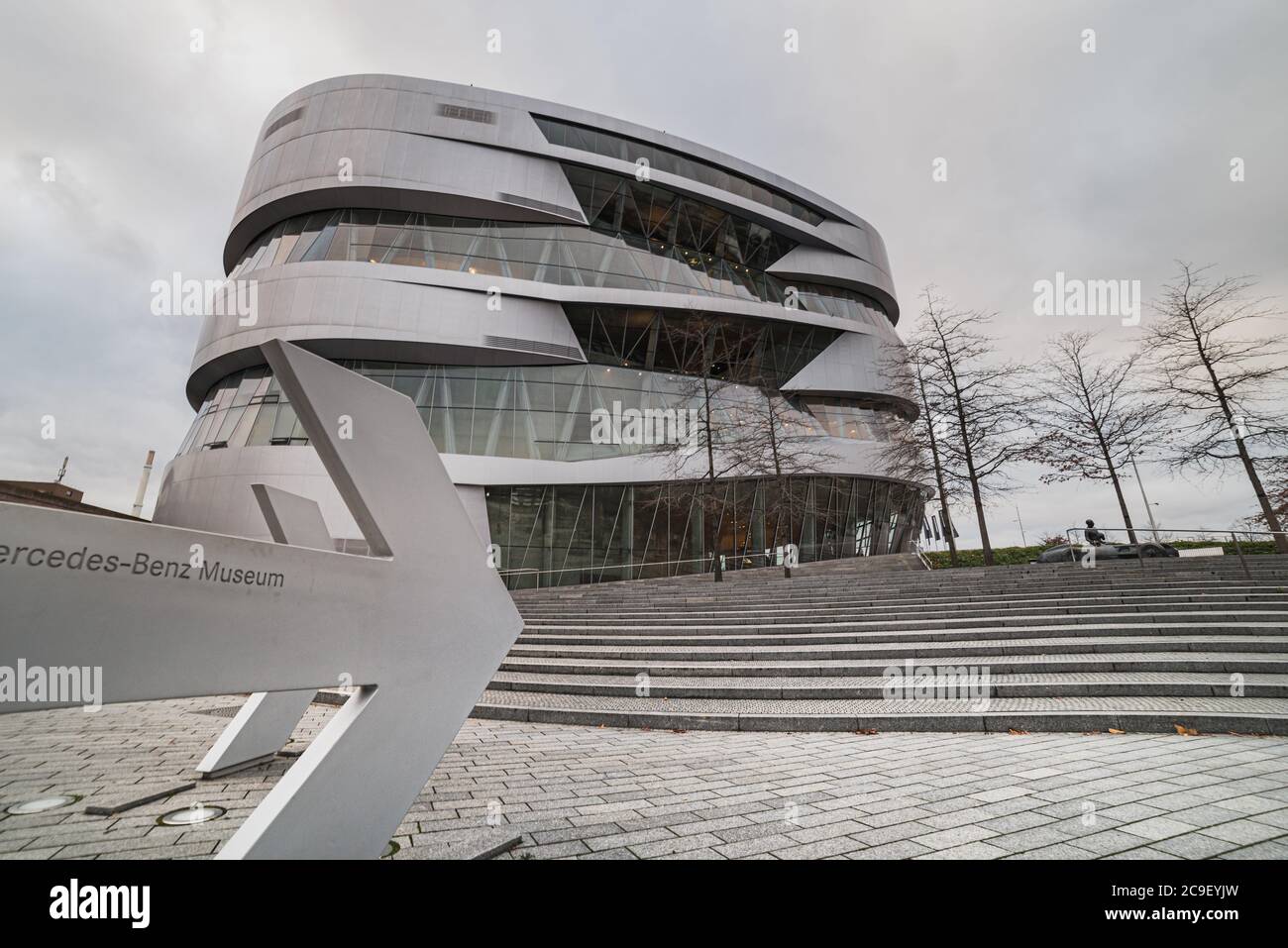 Arrows point to the Mercedes Benz Museum. Mercedes automotive, automobile and cars. Mercedes museum is an historical car display in Stuttgart, Germany Stock Photo
