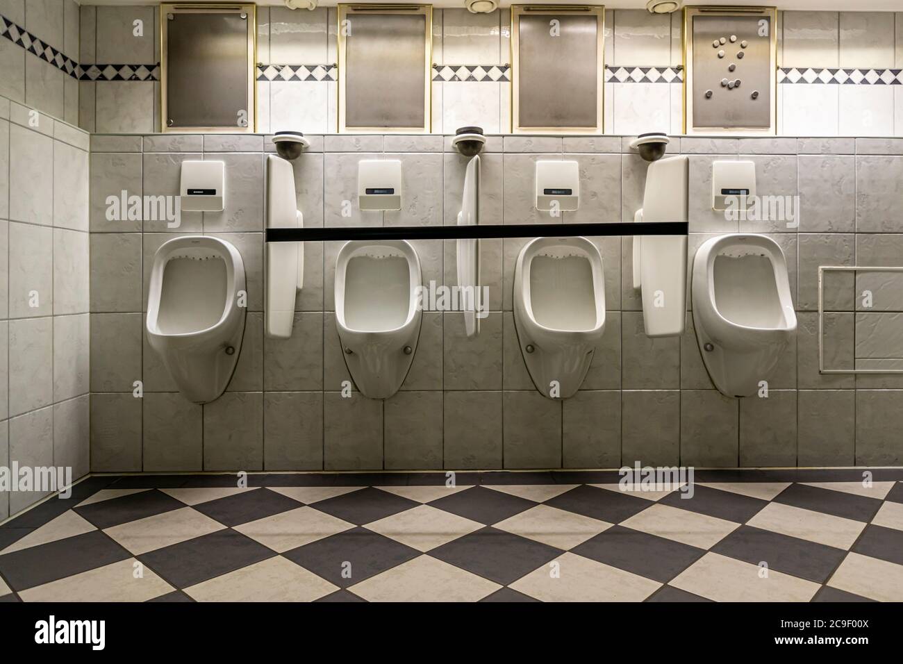 Urinals at a distance in Hotel Mühle, Binzen, Germany Stock Photo