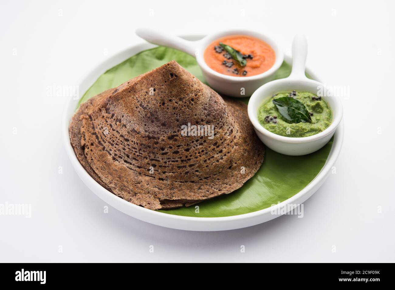 Finger Millet or Ragi Dosa is a healthy Indian breakfast served with chutney, in roll, flat or