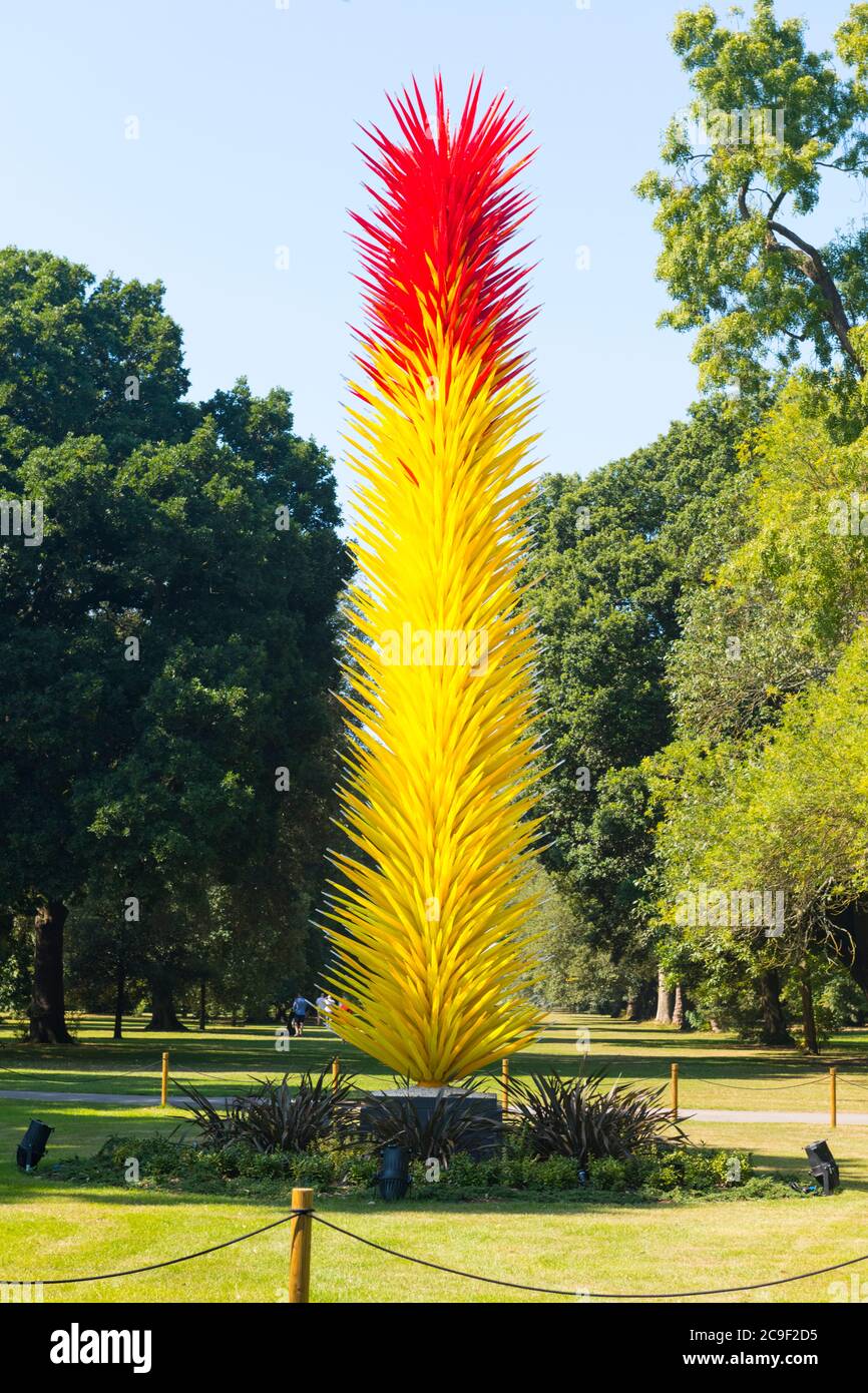 Kew Royal Botanical Gardens iconic Dale Chihuly Reflections Exhibition colourful glass sculptures sculpture art Scarlet and Yellow Icicle Tower Stock Photo