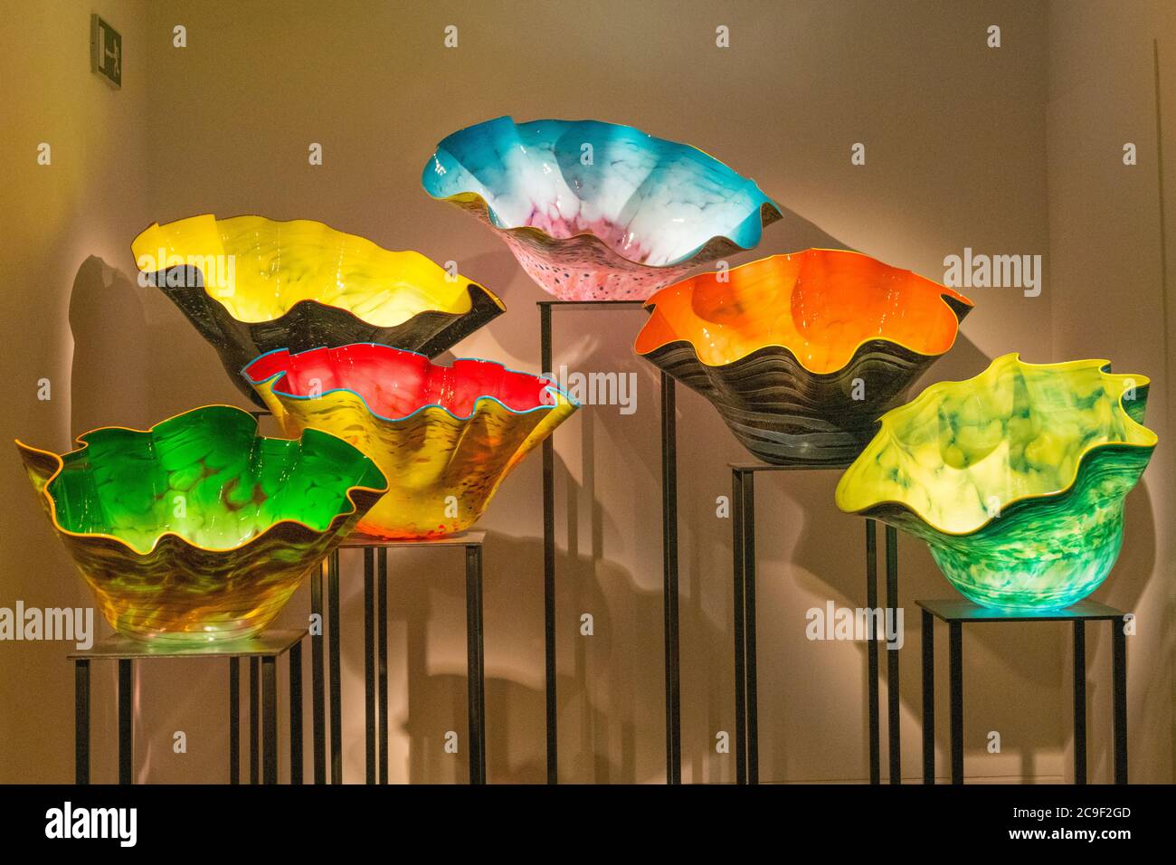 Kew Royal Botanical Gardens iconic Dale Chihuly Reflections Exhibition colourful glass sculptures sculpture art Museum Macchia Forest lip wrap bowls Stock Photo