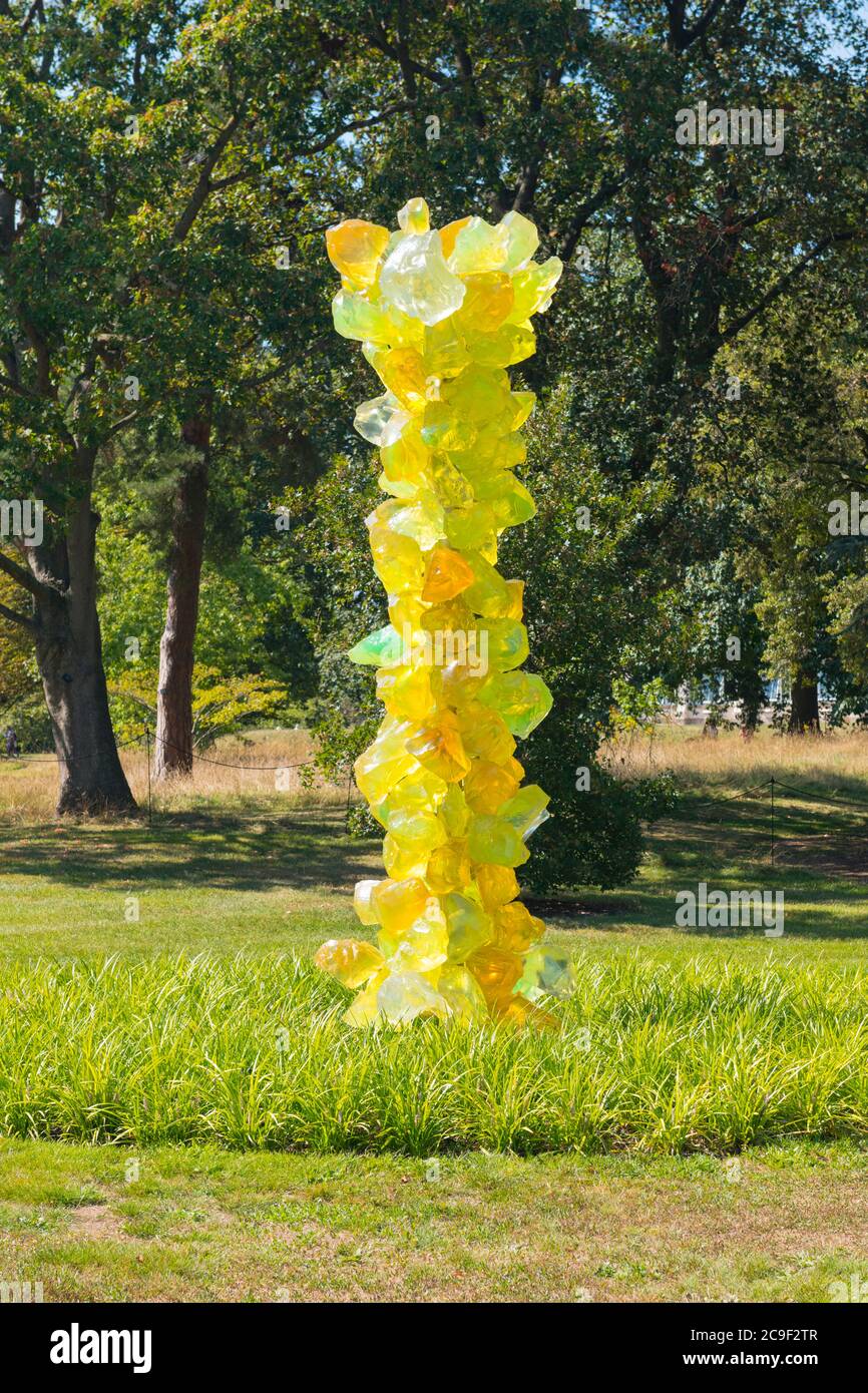 Kew Royal Botanical Gardens iconic Dale Chihuly Reflections Exhibition colourful glass sculptures sculpture Lime Crystal Tower yellow green orange Stock Photo