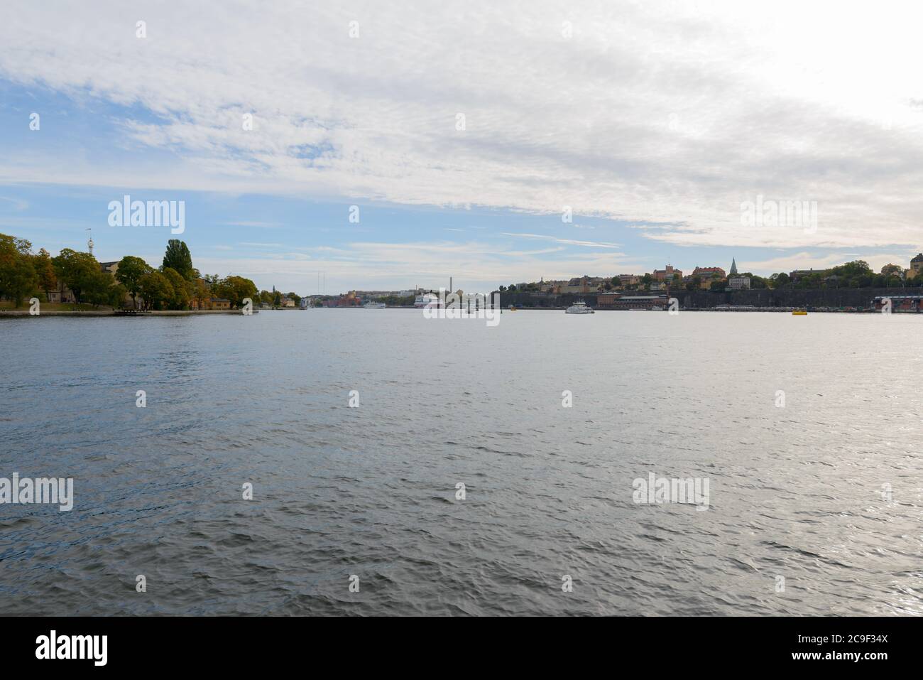 Portrait of city and lake against view of the sky in Stockholm, Sweden Stock Photo