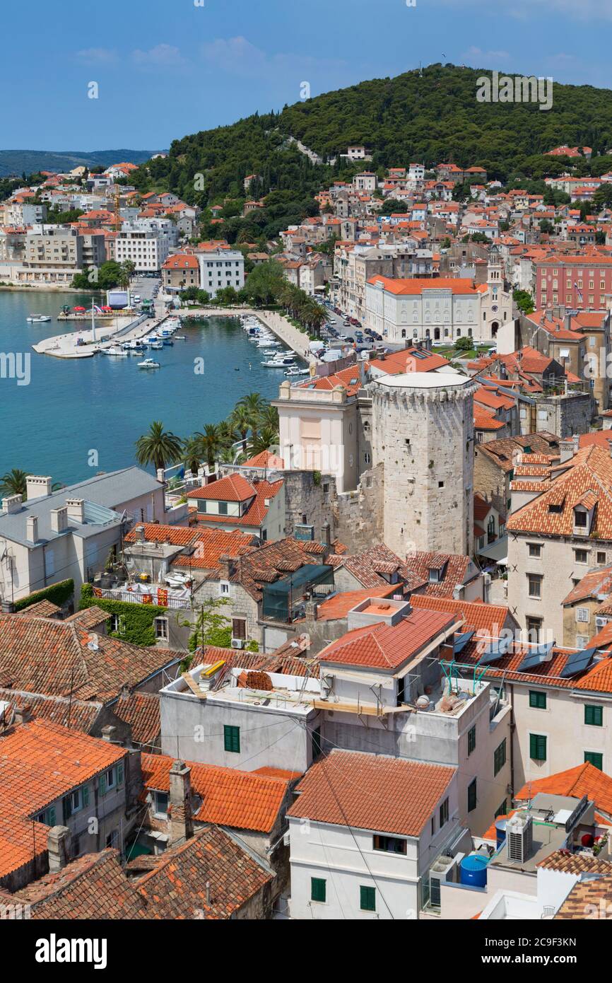 Split, Dalmatian Coast, Croatia.  High overall rooftop view with harbour. The tower is the 15th century Venetian Marina Tower in Brace Radic Square. T Stock Photo